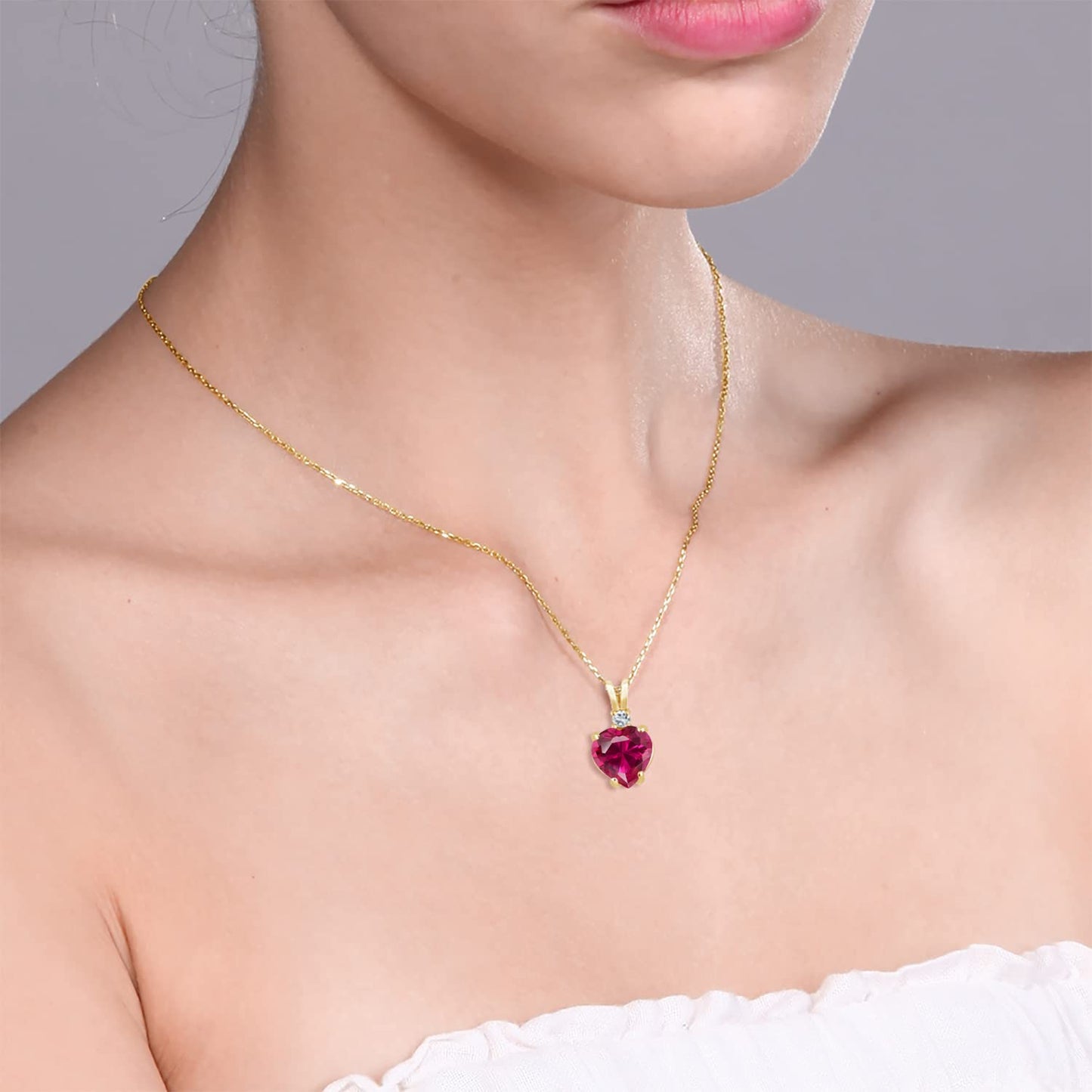 Gem Stone King 14K Yellow Gold Heart Shape Red Created Ruby and White Topaz Pendant Necklace For Women (2.27 Cttw, with 18 Inch Chain)