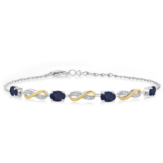 Gem Stone King 925 Sterling Silver and 10K Yellow Gold Oval Blue Sapphire and White Lab Grown Diamond Infinity Tennis Bracelet For Women (2.27 Cttw, Fully Adjustable Up to 7.5 Inch)