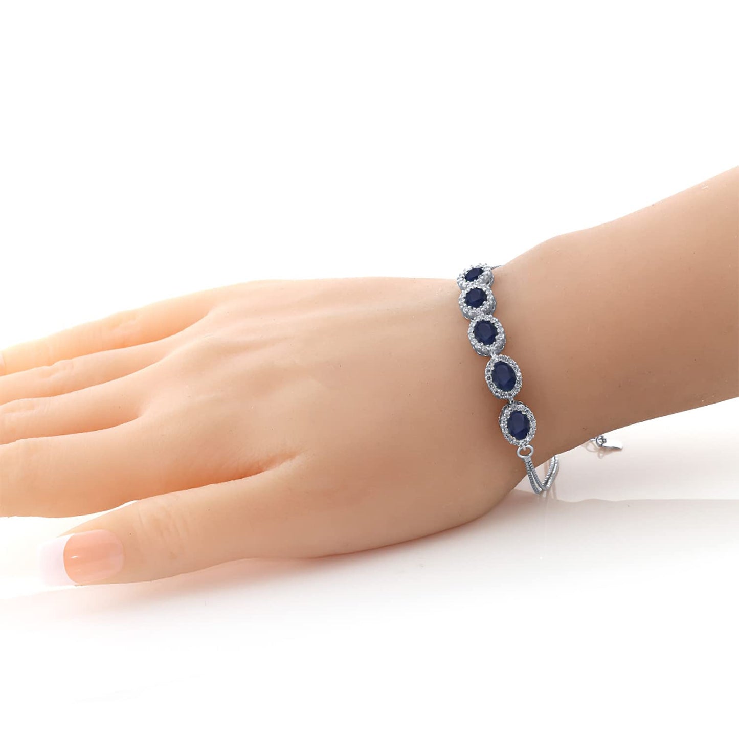 Gem Stone King 925 Sterling Silver Blue Sapphire Tennis Bracelet For Women (6.14 Cttw, Gemstone Birthstone, Center Stones: 7X5MM, 7 Inch + 1.5 inch Extender)