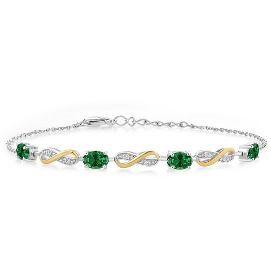 Gem Stone King 925 Sterling Silver and 10K Yellow Gold Green Created Emerald and White Lab Grown Diamond Tennis Bracelet For Women (1.45 Cttw, Oval 6X4MM, Fully Adjustable Up to 7.5 Inch)