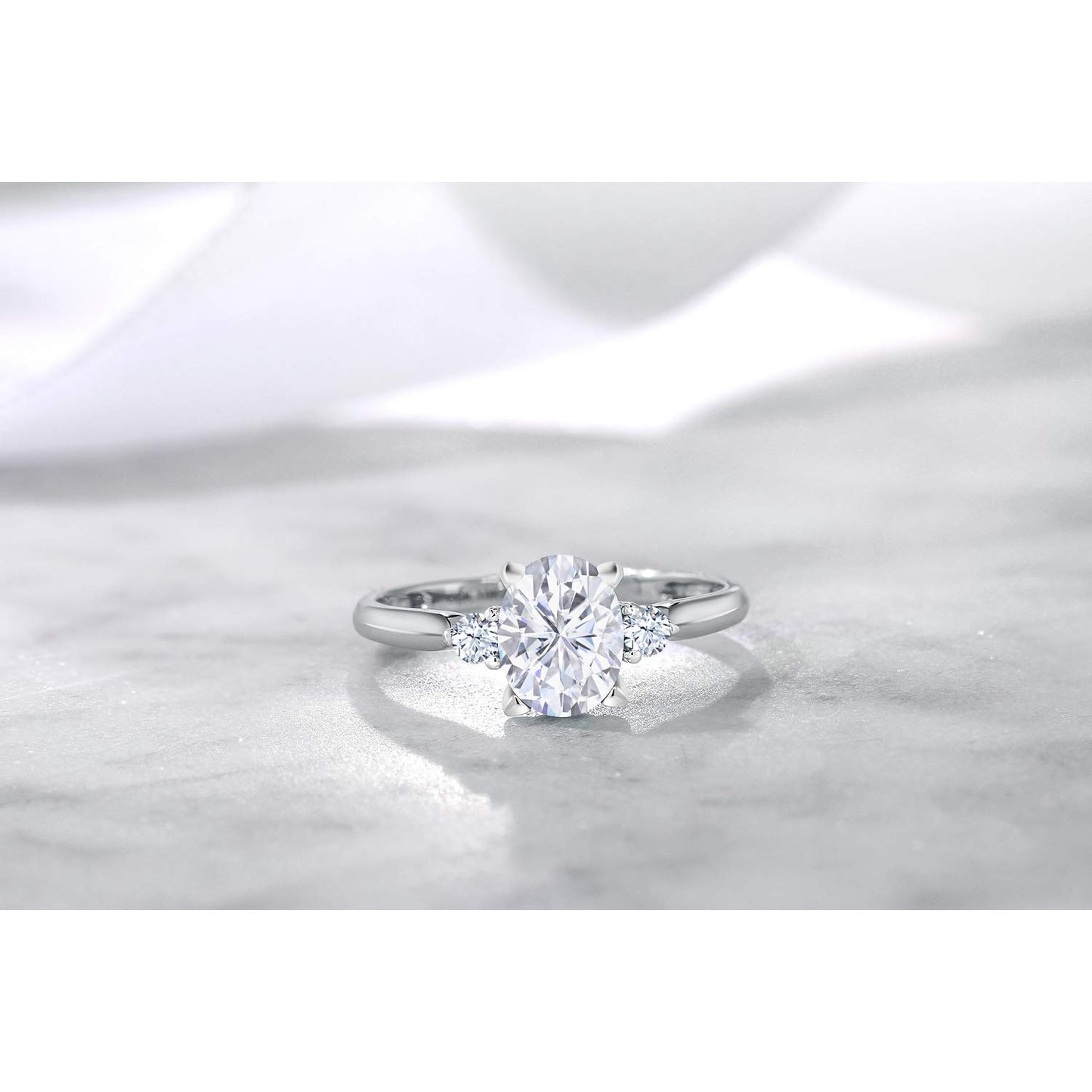 10K White Gold Forever Classic Moissanite by Charles & Colvard and White Created Sapphire Women Solitaire Ring (1.60 Cttw, Oval 8X6MM, Available in Size 5,6,7,8,9)