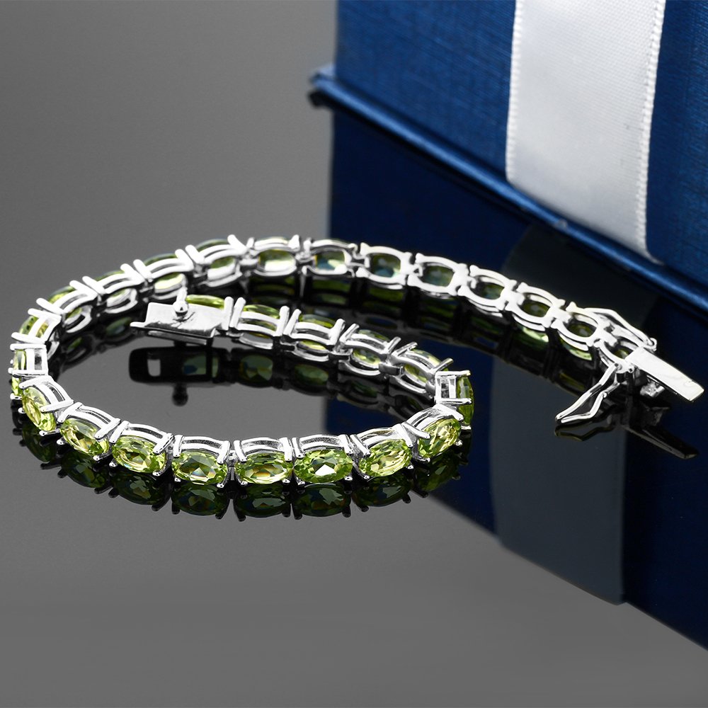 Gem Stone King Green Peridot Tennis Bracelet For Women | 925 Sterling Silver | 12.00 Cttw | Gemstone Birthstone | Oval 6X4MM | Length - 7 Inch | Fine Jewelry Gifts for Her Mom Women Wife