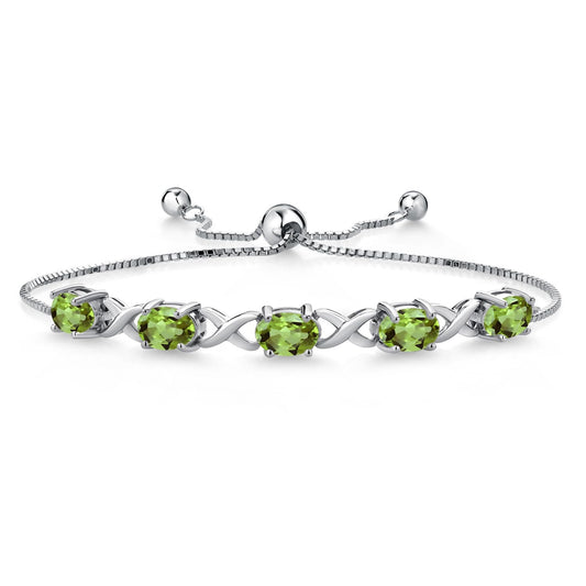 Gem Stone King 925 Sterling Silver Green Peridot Tennis Bracelet For Women (4.50 Cttw, Gemstone August Birthstone, Oval 7X5MM, Fully Adjustable Up to 9 Inches)