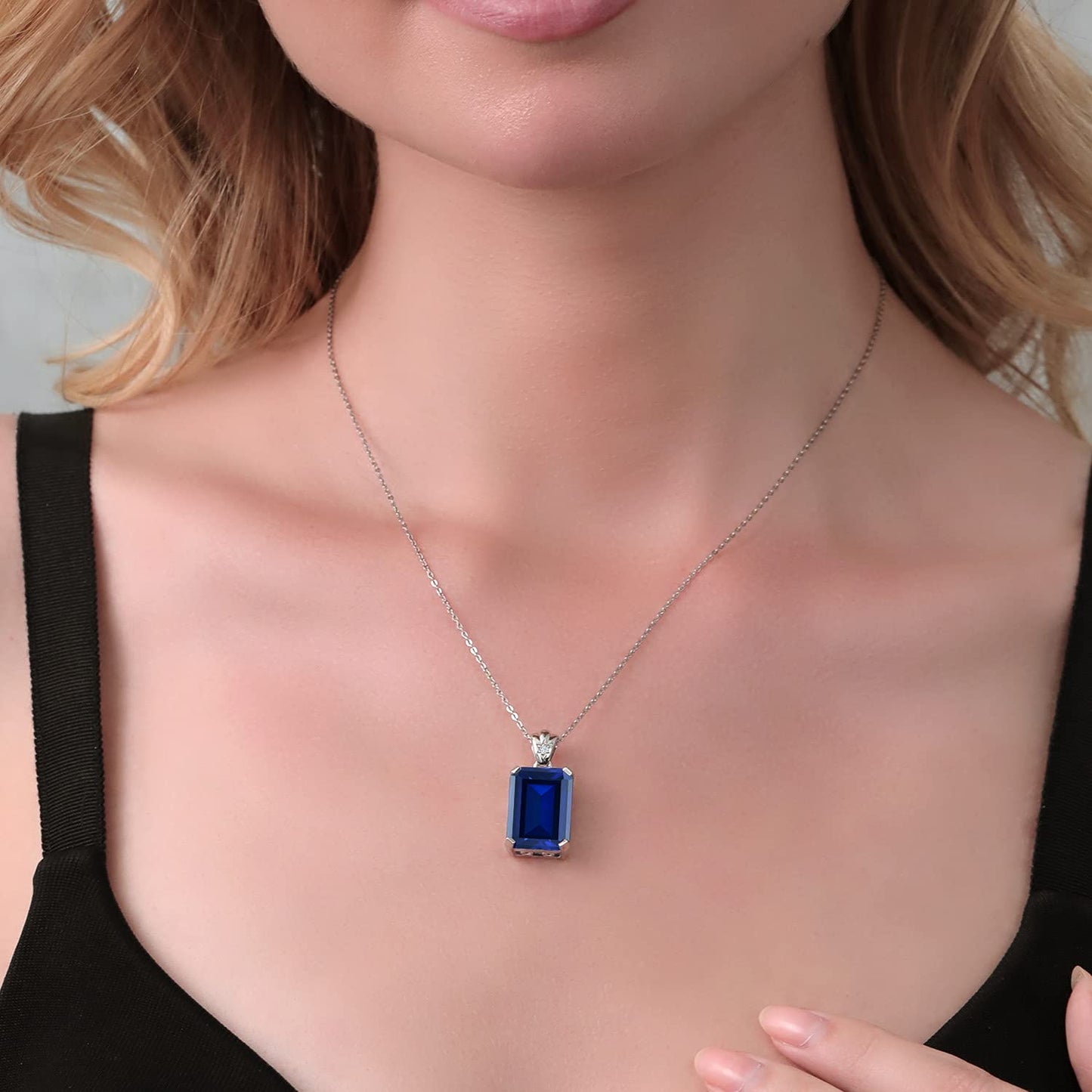 Gem Stone King 17.53 Cttw Blue Created Sapphire and White Topaz Pendant Necklace For Women | 925 Sterling Silver | Emerald Cut 18X13MM | With 18 Inch Silver Chain