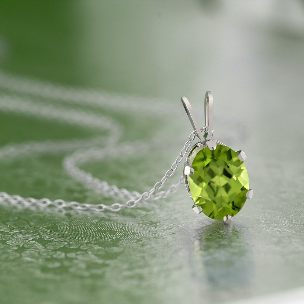 Gem Stone King 925 Sterling Silver Green Peridot Pendant Necklace (2.00 Cttw, Gemstone Birthstone, Oval 9X7MM, With 18 Inch Silver Chain)