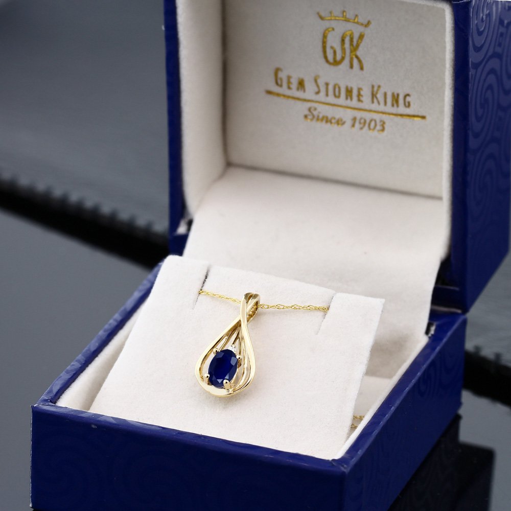 Gem Stone King 10K Yellow Gold Blue Sapphire and White Diamond Teardrop Pendant Necklace For Women (0.55 Cttw, Gemstone September Birthstone, Oval 6X4MM, with 18 Inch Chain)