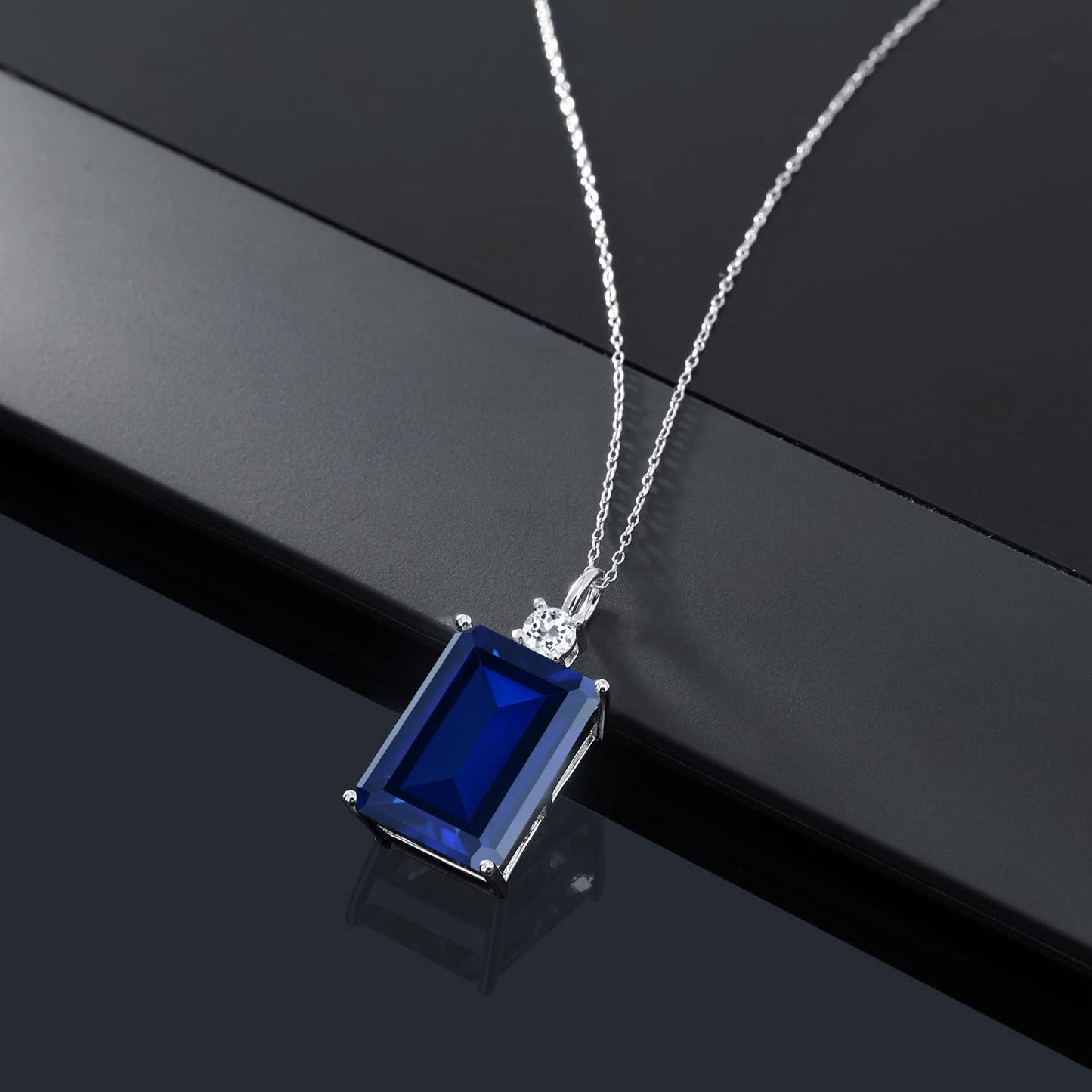 Gem Stone King 17.83 Cttw Blue Created Sapphire and White Topaz Pendant Necklace For Women In 925 Sterling Silver | Emerald Cut 18X13MM | With 18 Inch Silver Chain