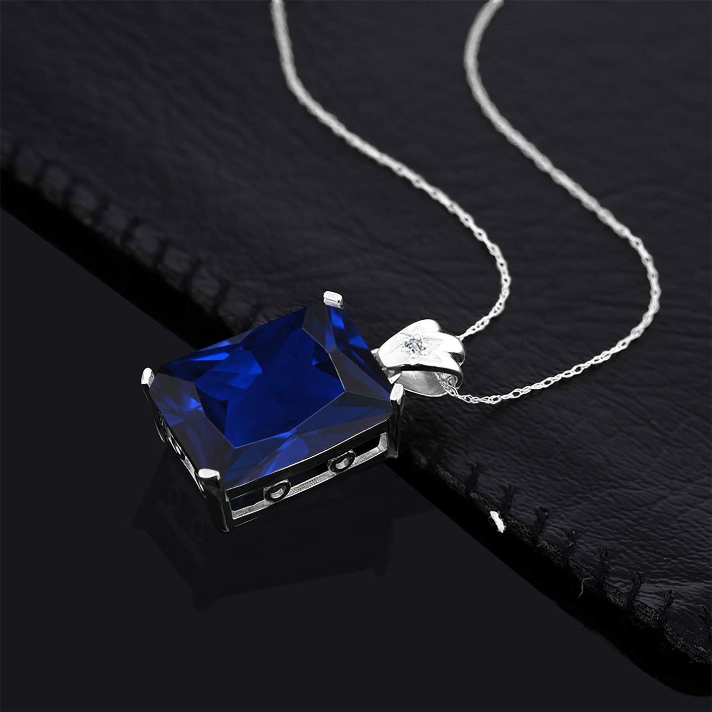 Gem Stone King 17.53 Cttw Blue Created Sapphire and White Topaz Pendant Necklace For Women | 925 Sterling Silver | Emerald Cut 18X13MM | With 18 Inch Silver Chain