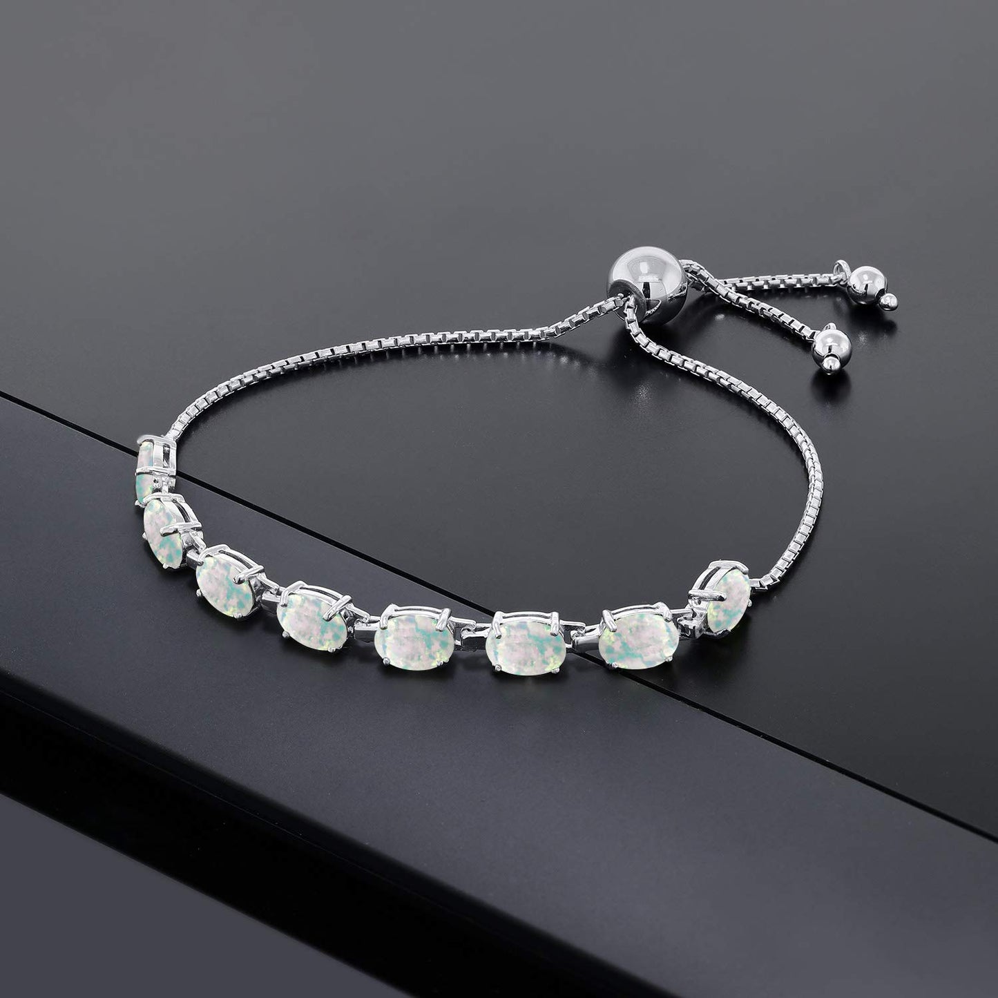 Gem Stone King 7X5MM Oval Gemstone Birthstone 8-Stone Tennis Bracelet For Women | 925 Sterling Silver | Bollo Bracelet | Fully Adjustable Up to 9 Inch | Easy-On Easy-Off