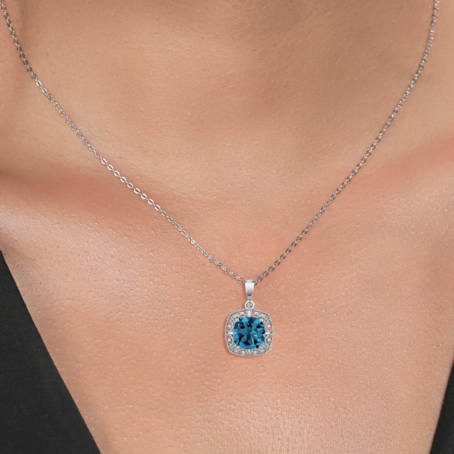 Gem Stone King 10K White Gold London Blue Topaz and White Diamond Accent Pendant Necklace For Women (2.74 Cttw, Gemstone Birthstone, 8MM Cushion Cut Center)