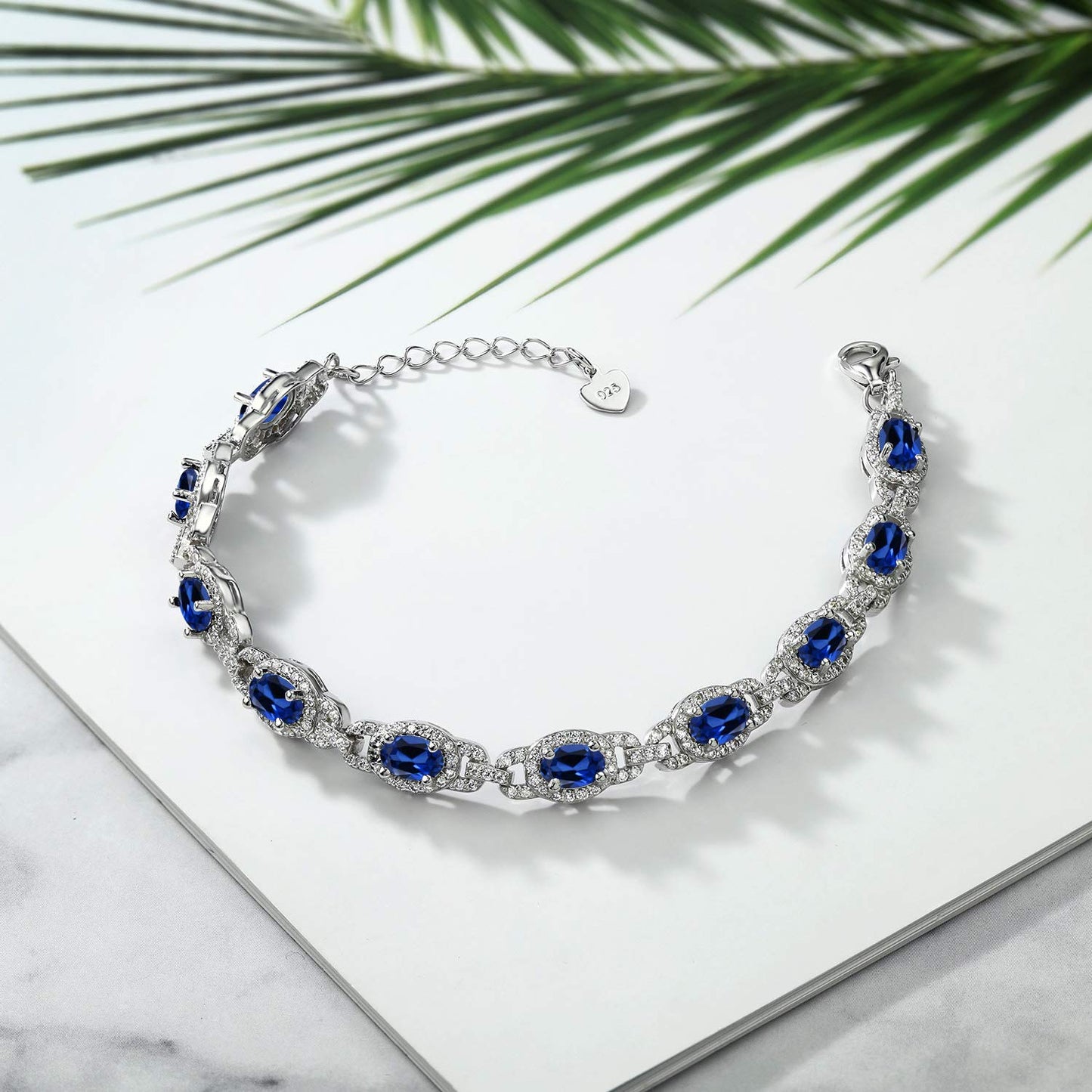 Gem Stone King 925 Sterling Silver Blue Created Sapphire Tennis Bracelet For Women (10.20 Cttw, Oval 6X4MM, 7 Inch With 1 Inch Extender)