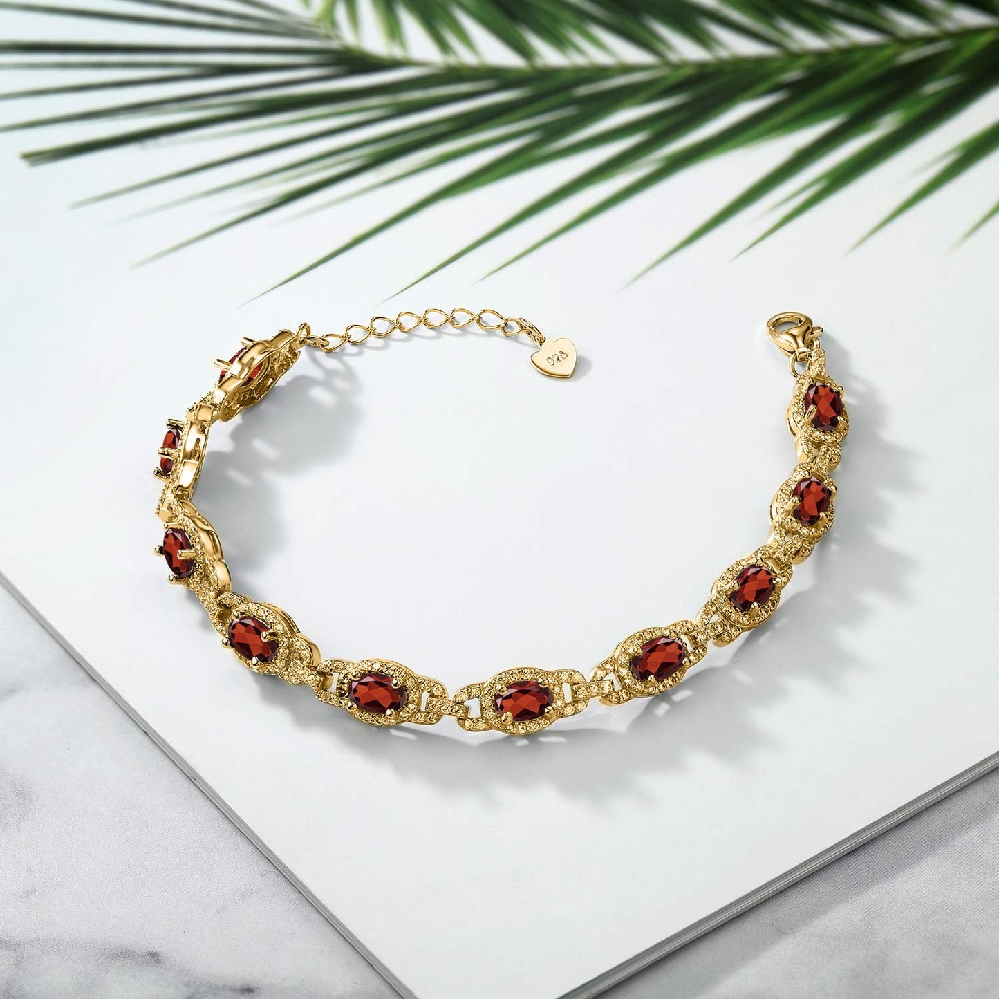 Gem Stone King 18K Yellow Gold Plated Silver Red Garnet Tennis Bracelet For Women (9.87 Cttw, Gemstone Birthstone, Oval 6X4MM, 7 Inch With 1 Inch Extender)