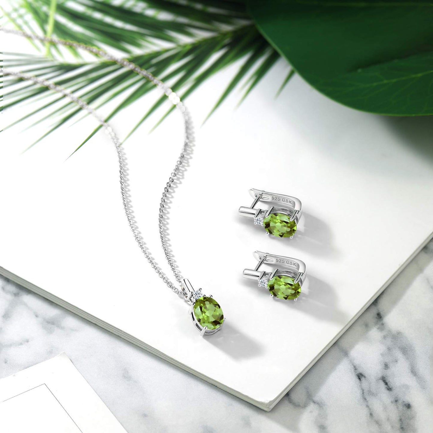 Gem Stone King 925 Sterling Silver Oval Green Peridot and White Topaz Pendant and Earrings Jewelry Set For Women (4.13 Cttw, Gemstone Birthstone, with 18 Inch Chain)