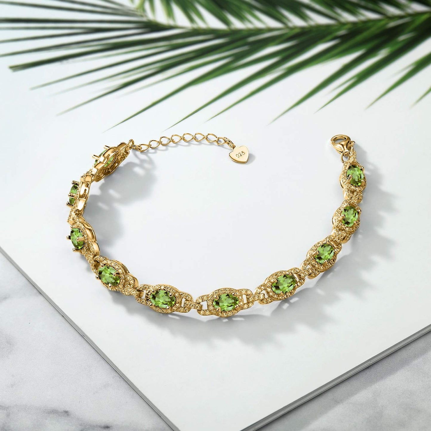 Gem Stone King 18K Yellow Gold Plated Silver Green Peridot Tennis Bracelet For Women (9.10 Cttw, Gemstone Birthstone, Oval 6X4MM, 7 Inch With 1 Inch Extender)