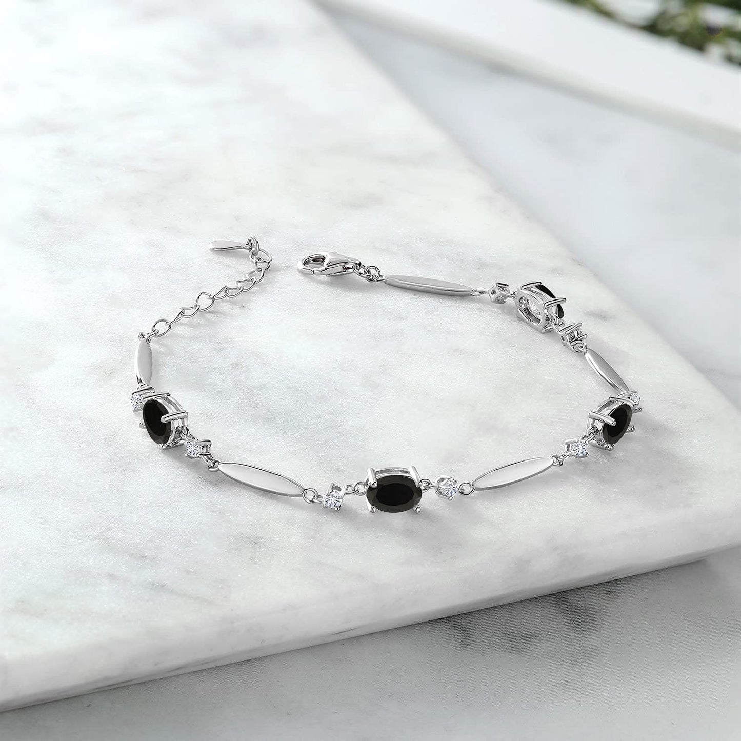 Gem Stone King 3.10 Cttw Black Onyx and White Moissanite Tennis Bracelet For Women In 925 Sterling Silver | Gemstone December Birthstone | Oval 7X5MM | 6 Inch + 1 Inch Extender