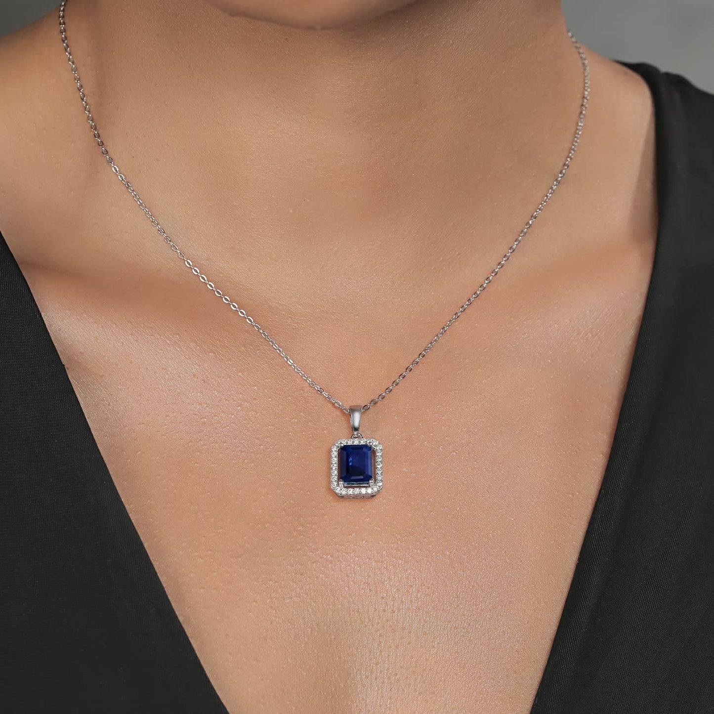 Gem Stone King 925 Sterling Silver Gemstone Birthstone Halo Necklace | Emerald Cut 9X7MM | Halo Pendant Necklace for Women | with 18 Inch Silver Chain