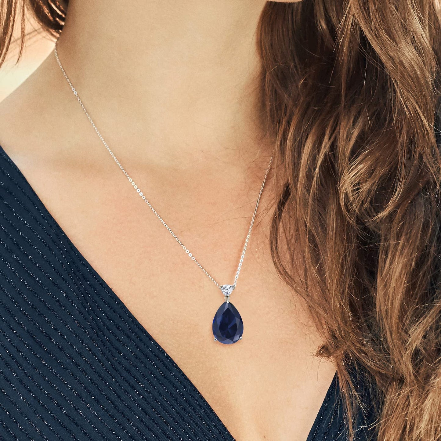 Gem Stone King 13.10 Cttw Created Blue Sapphire and White Moissanite Teardrop Pendant Necklace For Women | 925 Sterling Silver | Pear Shape 18X13MM | With 18 Inch Chain